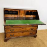 A George III marquetry-inlaid mahogany fall-front bureau