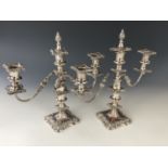 A pair of Victorian electroplate silver two-branch three-light candelabra, 36 cm