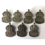 7 ARP silver lapel / hat badges