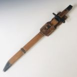 An Imperial Japanese Toyoda Jidoshoki Seisakusho Type 30 bayonet in wooden scabbard with rubber