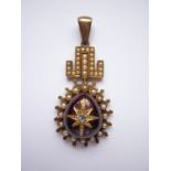 A Victorian diamond, garnet and pearl pendant of antique influence, having a pivoting Greek key