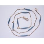 A Belle Epoque period delicate yellow-metal and cornflower blue guilloche-enamelled neck chain,