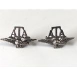 A pair of Second World War Air Transport Auxiliary white metal collar badges