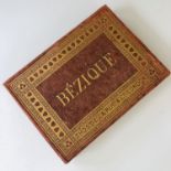 A Victorian Thomas De La Rue & Co boxed card game of Bezique, with pen and ink inscription to the