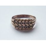 A vintage rose-yellow-metal dress ring, the herringbone face studded with two rows of small