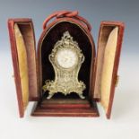 A 19th century gilt white-metal and mother of pearl boudoir miniature clock, in the style of a Louis