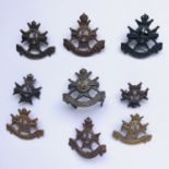 A quantity of Sherwood Foresters officers' Service Dress badges