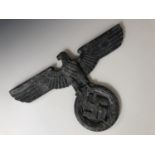 A German Third Reich cast alloy eagle plaque, 38 cm