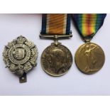 British War and Victory Medals [engraved] to 97693 Rflm C E Austin Rfl Bgd, with cap badge