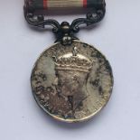 An India General Service Medal with North West Frontier 1936-37 clasp to 1395 Rfm Chandre Gurung,