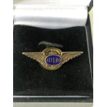 An early Second World War Atlantic Ferry Organization pilot's enamelled white metal lapel badge, (