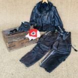 A Luftwaffe pilot's flying clothing group comprising late-War two-piece electrically wired leather