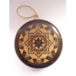 A late 19th century Mauchline Ware yo-yo in the manner of Thomas Barton, 8 cm diameter