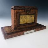 A 1940s oak ink stand modelled as the Luneberg Heath memorial of the surrender of the German High