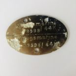 A German Third Reich Kriegsmarine identity disc