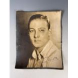 A period gelatin silver print studio photograph of actor Rudolph Valentino (1895-1926) by