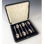 A cased set of six George V silver bead pattern coffee spoons, C W Fletcher & Son, Sheffield,