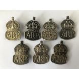 7 ARP silver lapel / hat badges