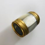 A lacquered brass, gilt-metal and mother-of-pearl spy glass, of barrel form, 7.5 cm extended