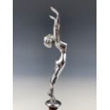 A Desmo chromium plated car mascot in the form of a female nude with up-stretched arms, 17 cm