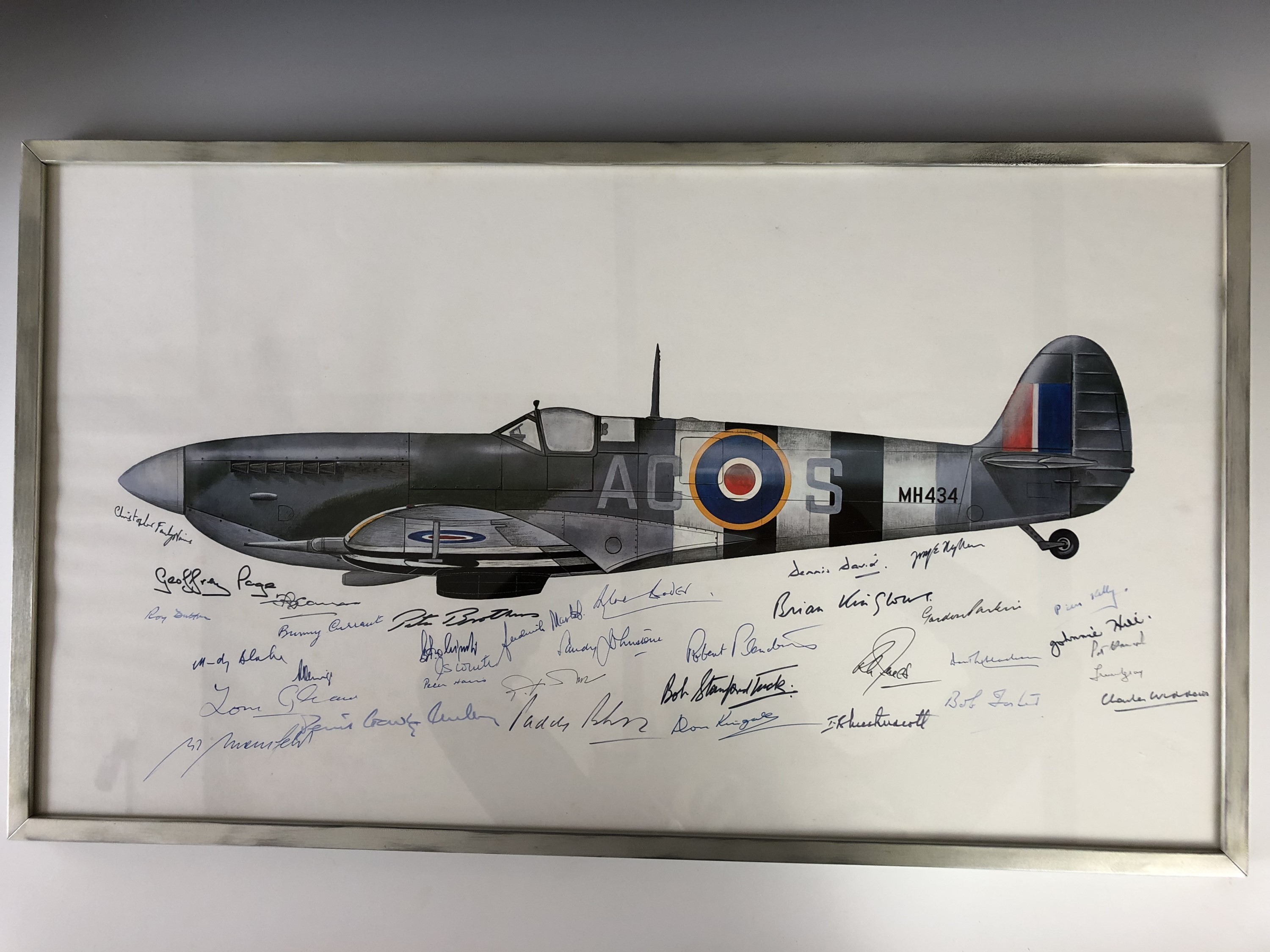 [Autographs] An illustration of an RAF Spitfire in flight, offset-lithographic print, signed beneath