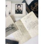 A group of Second World War Royal Navy photographs, documents and insignia including a bullion-