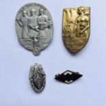 Three German Third Reich lapel badges and a Hitler Youth enamelled badge