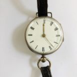 A Victorian silver cased fob watch with period conversion to be worn on the wrist, having a key