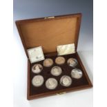 A Birmingham Mint cased presentation set of nine silver medals 'Queens of the British Isles',