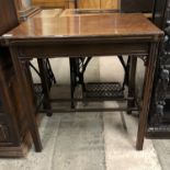 A George V mahogany Chippendale style turn-over-top games table