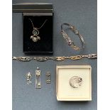 A quantity of Charles Rennie Mackintosh style white-metal (tests as silver) jewellery, including a