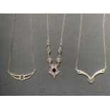 Three contemporary silver / white metal (tests as silver) pendant necklaces, 14.7g
