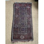 An oriental rug, 202 x 95 cm