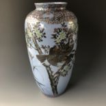 A Meiji Japanese blue-ground Kutani porcelain elongated oviform vase, 38 cm (a/f)