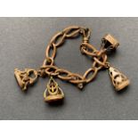 A Victorian rolled-gold charm bracelet with four fob seals