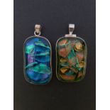 Two contemporary silver / white metal (tests as silver) and dichroic glass pendants, 5 cm each