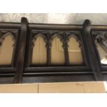 A Victorian Gothic Revival carved oak altar rail