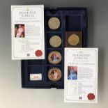 Two Westminster QEII Diamond Jubilee gold-plated collectors' coins, a QEII Coronation Souvenir
