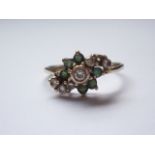 A vintage 9ct gold, cubic zirconia and green stone dress ring, in a scrolling flower-head cluster