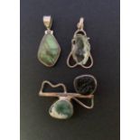 Three contemporary silver / white metal (tests as silver) and hardstone pendants, including a