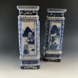 Two blue and white reproduction Japanese vases and stands