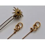 Two late 19th / early 20th Century Charles Horner style gilt-metal hat pins and one other en