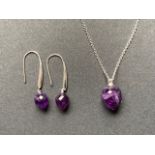 A contemporary white metal (tests as silver) and amethyst pendant necklace and earring set, each