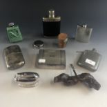 Collectors' items including four hip flasks, cork screws, a table lighter and a cigarette box etc