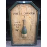 A Moët and Chandon champagne advertising board, 58 x 93 cm