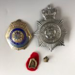 A quantity of police and other badges