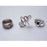 Three contemporary white metal (tests as silver) rings, of Celtic influence, 10.6g