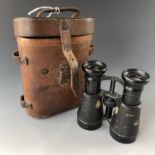 A set of Great War "Regulation Military" binoculars in 1918 dated ordnance issue case