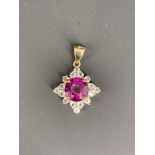 A contemporary 9ct gold, pink stone and cubic zirconia flower head cluster pendant, 2.2 g