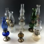 Nine various oil lamps